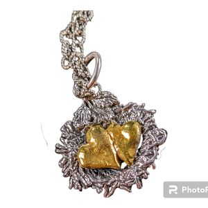 Waxing Poetic nesting hearts necklace